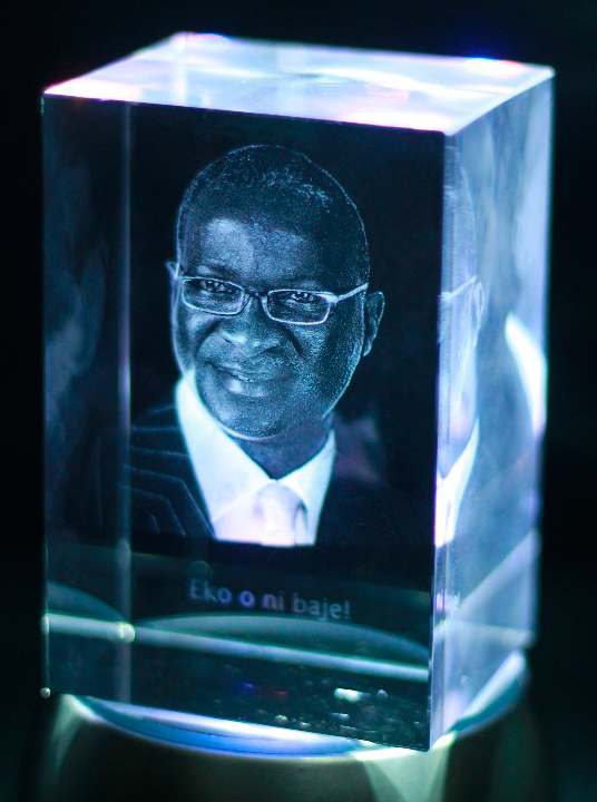Elegant crystal cube with 3D image engraving and rotating platform for office awards